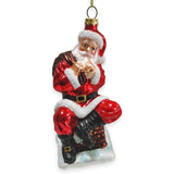 Santa Claus on Chimney Glass Christmas Ornament